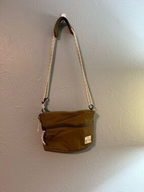 Lululemon Olive Crossbody Bag with adjustable White Rope Strap